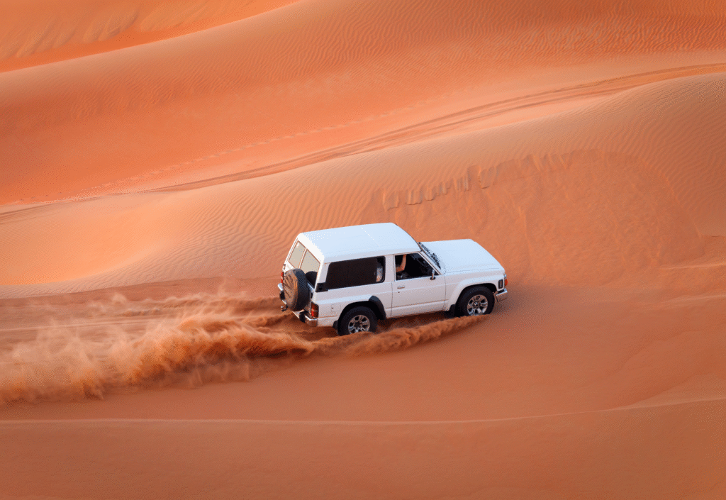 Evening Desert Safari Dubai by Desert Crescent – experience sunset dune bashing, camel rides, and traditional desert camp activities.